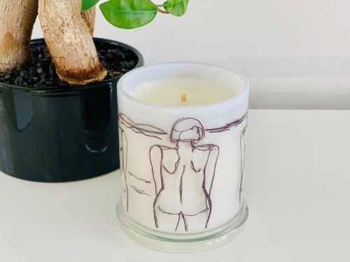 Designer Candles By Sarah Jane - Black and White Artwork of a woman at the beach called Linear III