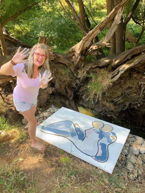 adelaide artist sarah jane paints loving couple bodyline xv near south australian creek