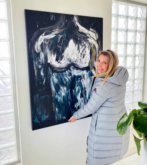 adelaide artist sarah jane with man in isolation painting - mans body